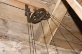 Clock cable pulleys