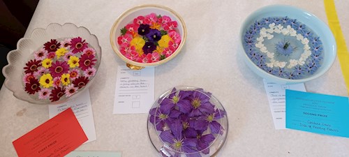 Floating flowers in a dish