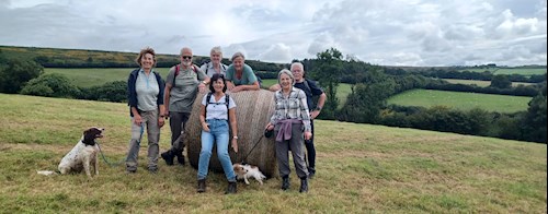 One of the challenges - climb the bale! With a little help from her friends, Liz won this challenge.
